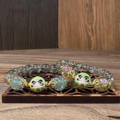 綠碧髮。琉璃珠。達摩 | Green Rutilated Quartz Daruma Bracelet